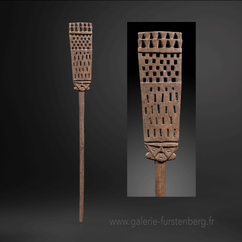 Chancay sculpted stick